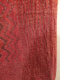 hand-stitched quilt